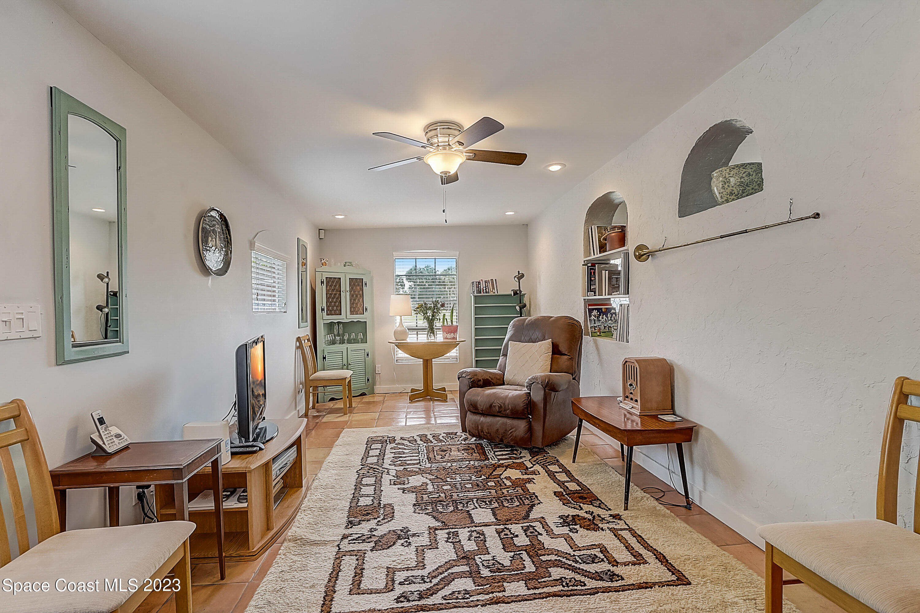 201 Cherry Street Melbourne, FL 32901 - Photo 10 of 22 a living room with furniture rug and window