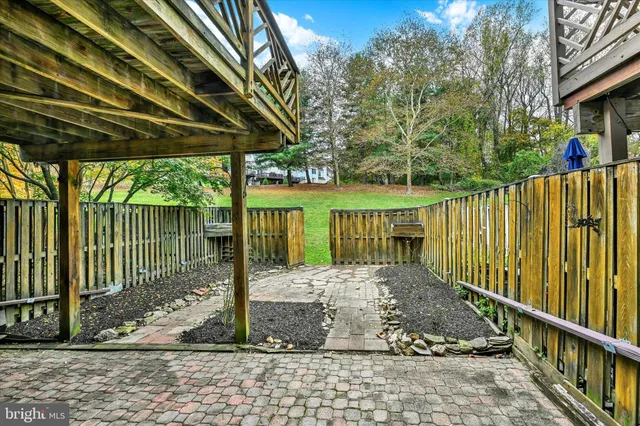a view of a backyard with a patio