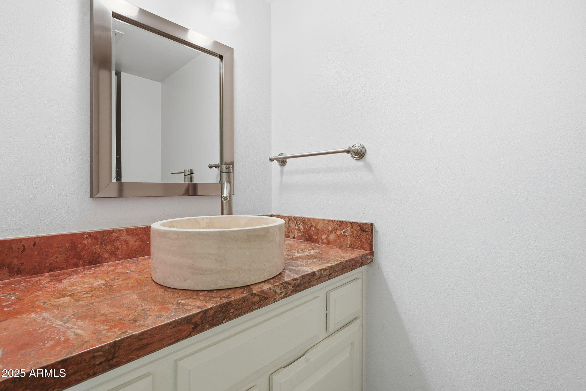 2131 East Bethany Home Road Phoenix, AZ 85016 - Photo 17 of 54 a bathroom with a sink and a mirror