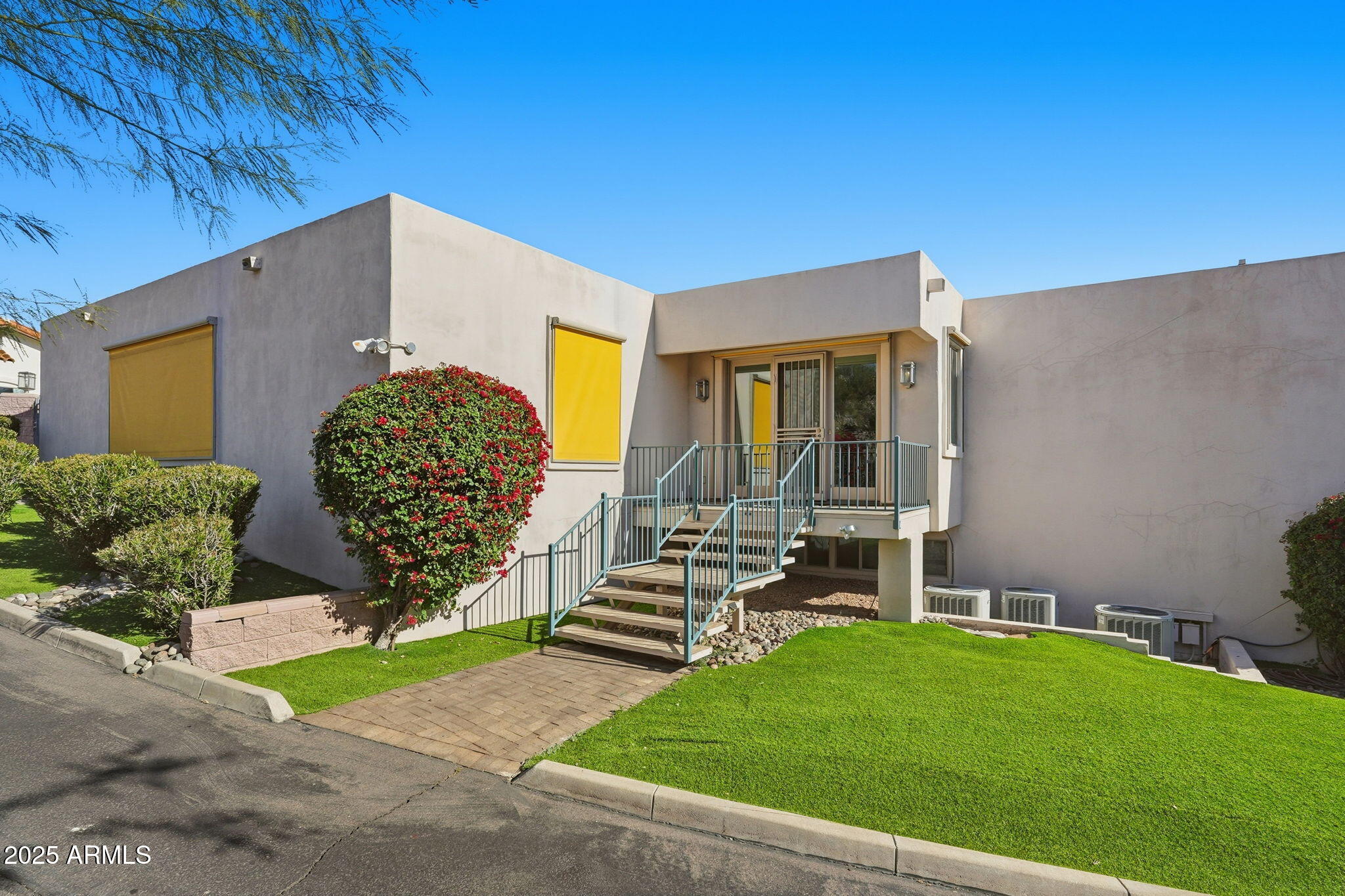 2131 East Bethany Home Road Phoenix, AZ 85016 - Photo 2 of 54 a front view of a house with garden