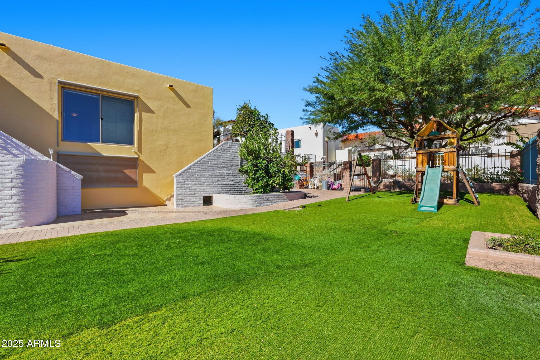 2131 East Bethany Home Road Phoenix, AZ 85016 - Photo 44 of 54 a front view of a house with a garden