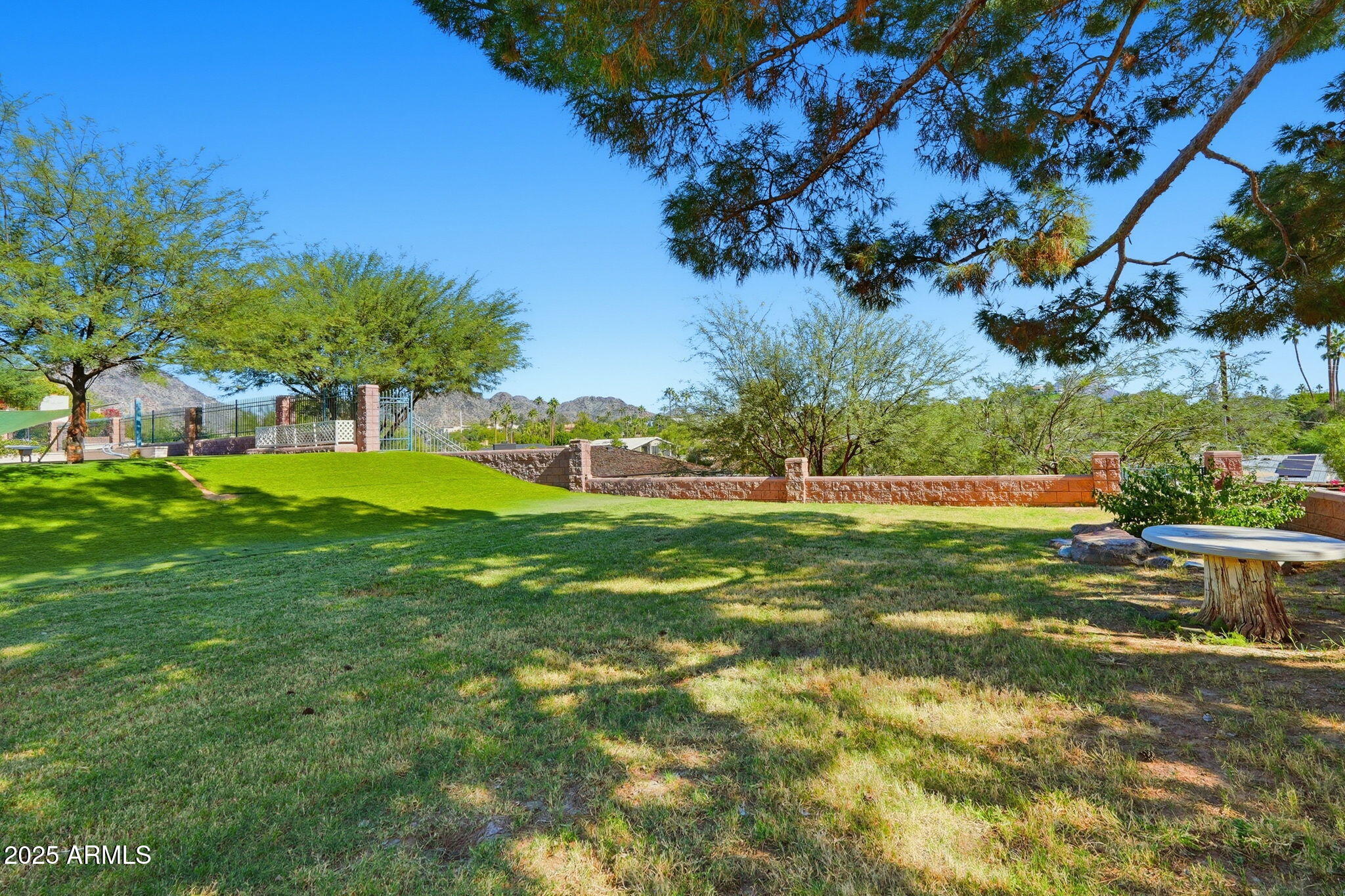 2131 East Bethany Home Road Phoenix, AZ 85016 - Photo 46 of 54 a view of yard with swimming pool and green space