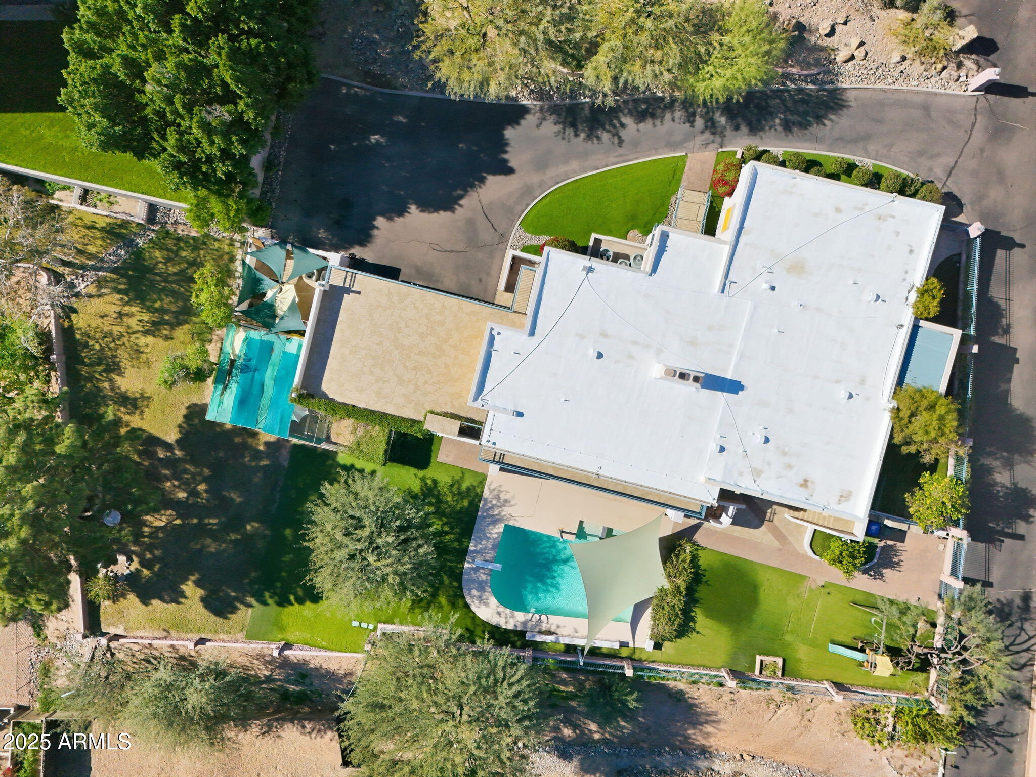 2131 East Bethany Home Road Phoenix, AZ 85016 - Photo 53 of 54 an aerial view of a house with a yard and pool