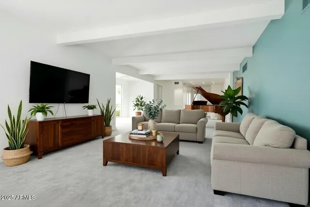 a bathroom with a granite countertop toilet sink and mirror