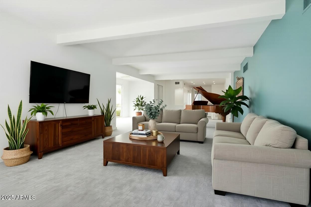 2131 East Bethany Home Road Phoenix, AZ 85016 - Photo 6 of 54 a living room with furniture and a flat screen tv