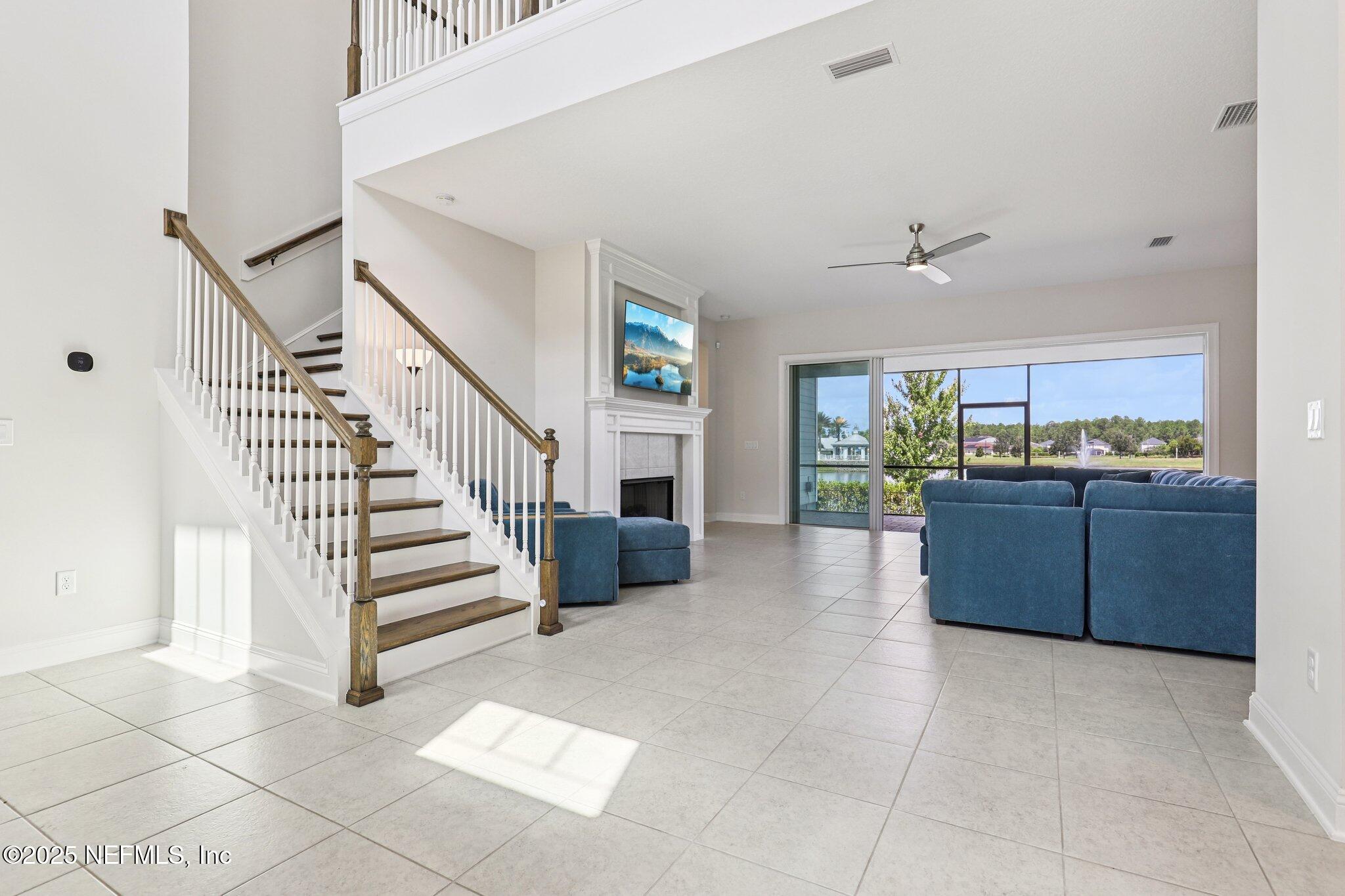194 Snowbell Court St. Augustine, FL 32095 - Photo 19 of 89 a view of a livingroom with furniture and staircase