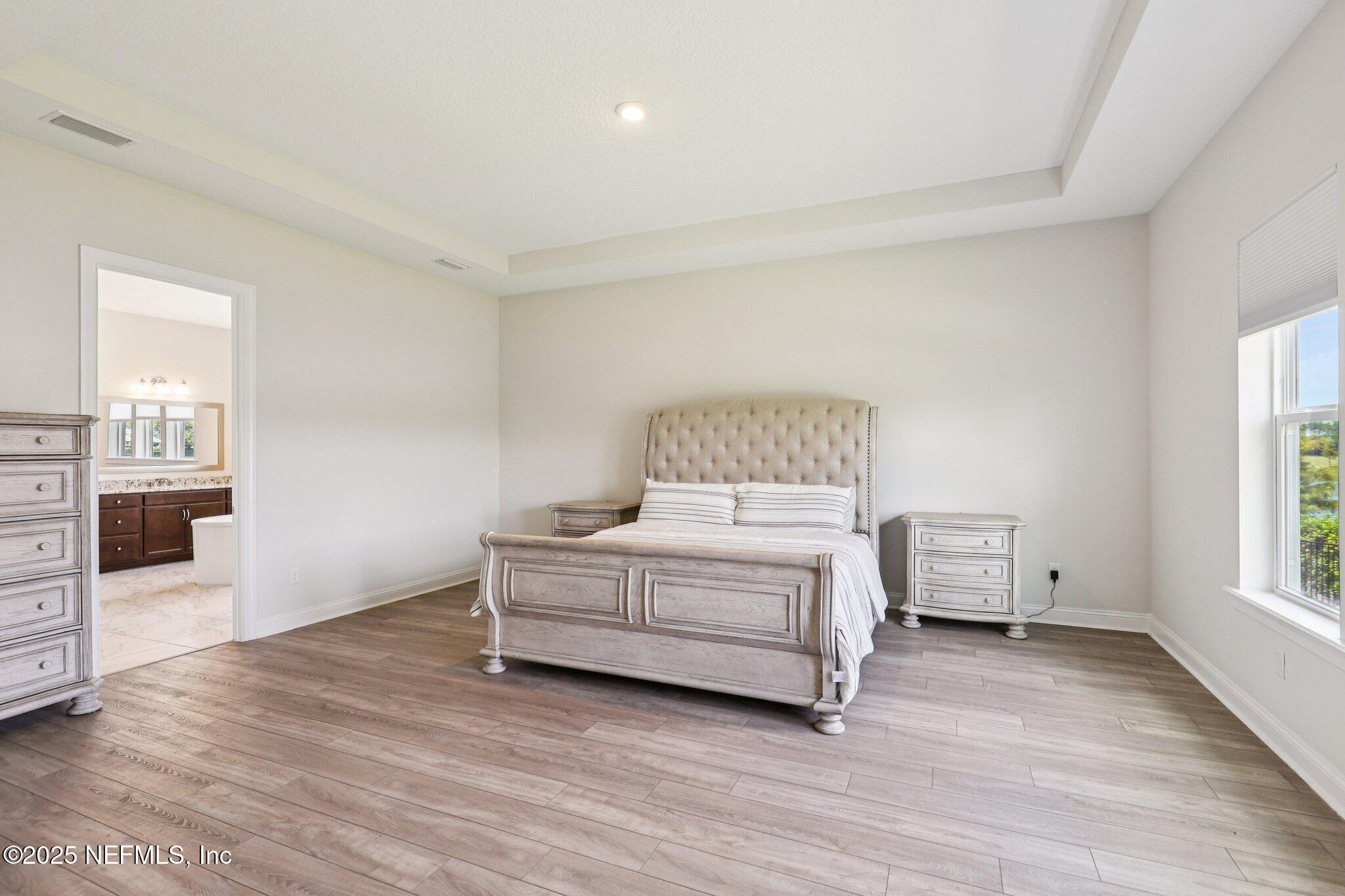 194 Snowbell Court St. Augustine, FL 32095 - Photo 25 of 89 a room with a bed and window