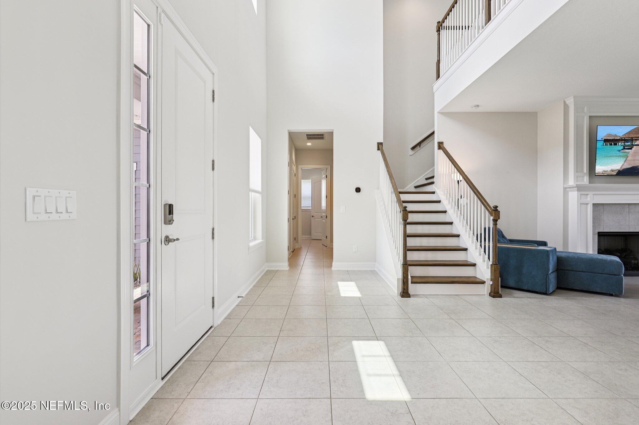 194 Snowbell Court St. Augustine, FL 32095 - Photo 35 of 89 a view of entryway and hall with wooden floor