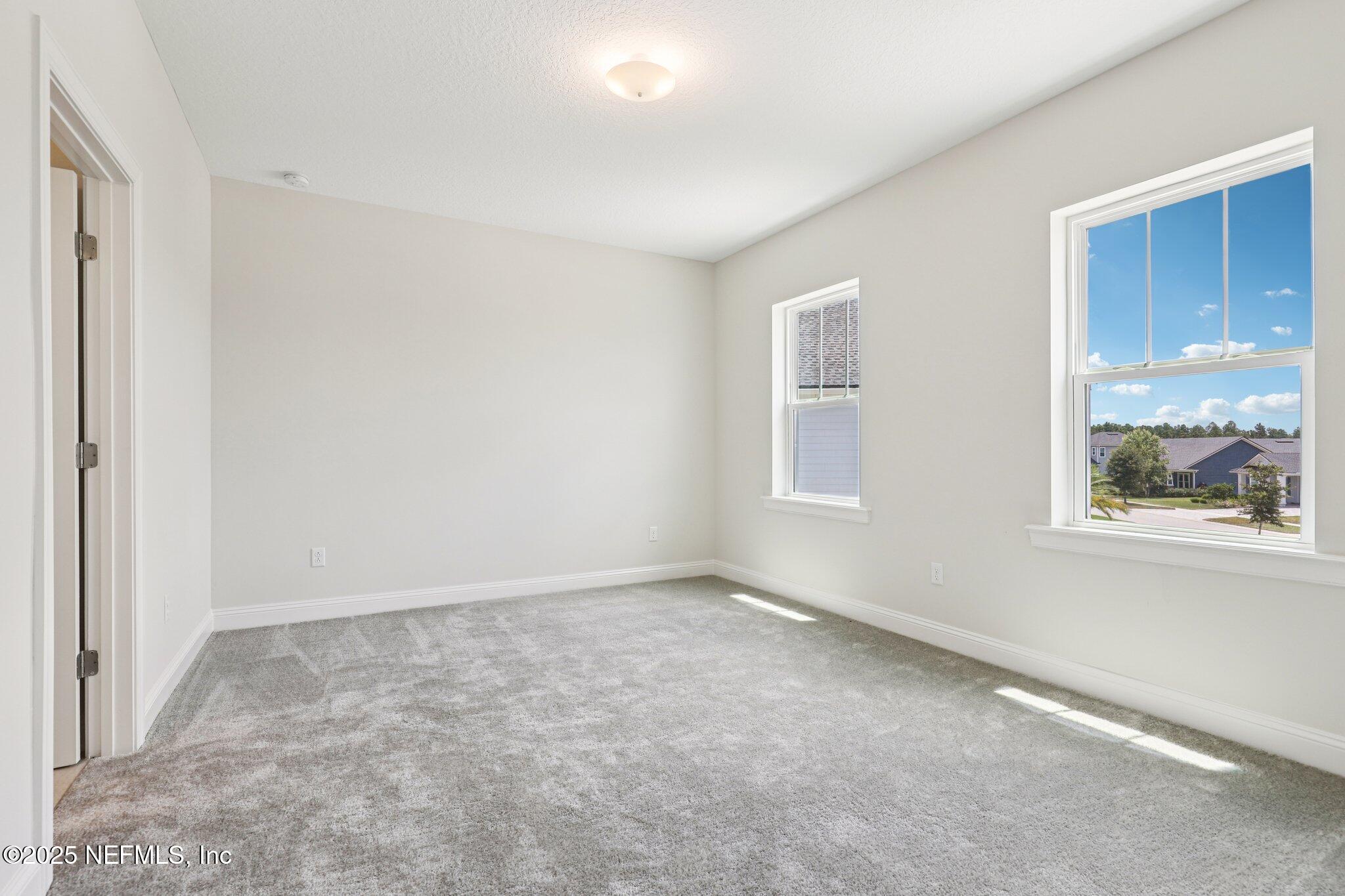 194 Snowbell Court St. Augustine, FL 32095 - Photo 47 of 89 a view of an empty room with a window