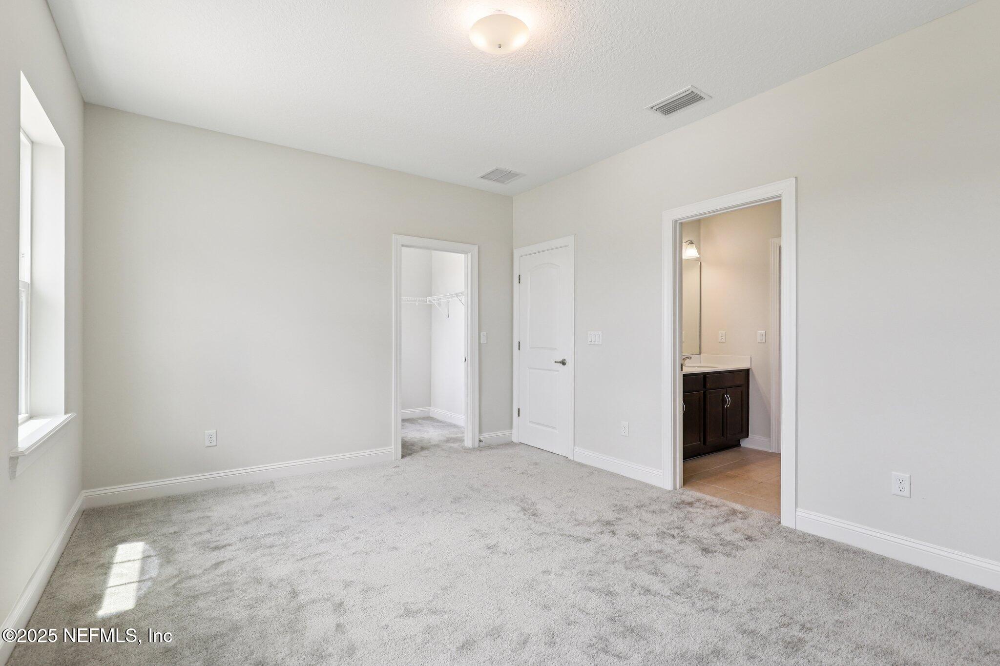194 Snowbell Court St. Augustine, FL 32095 - Photo 48 of 89 a view of an empty room and window