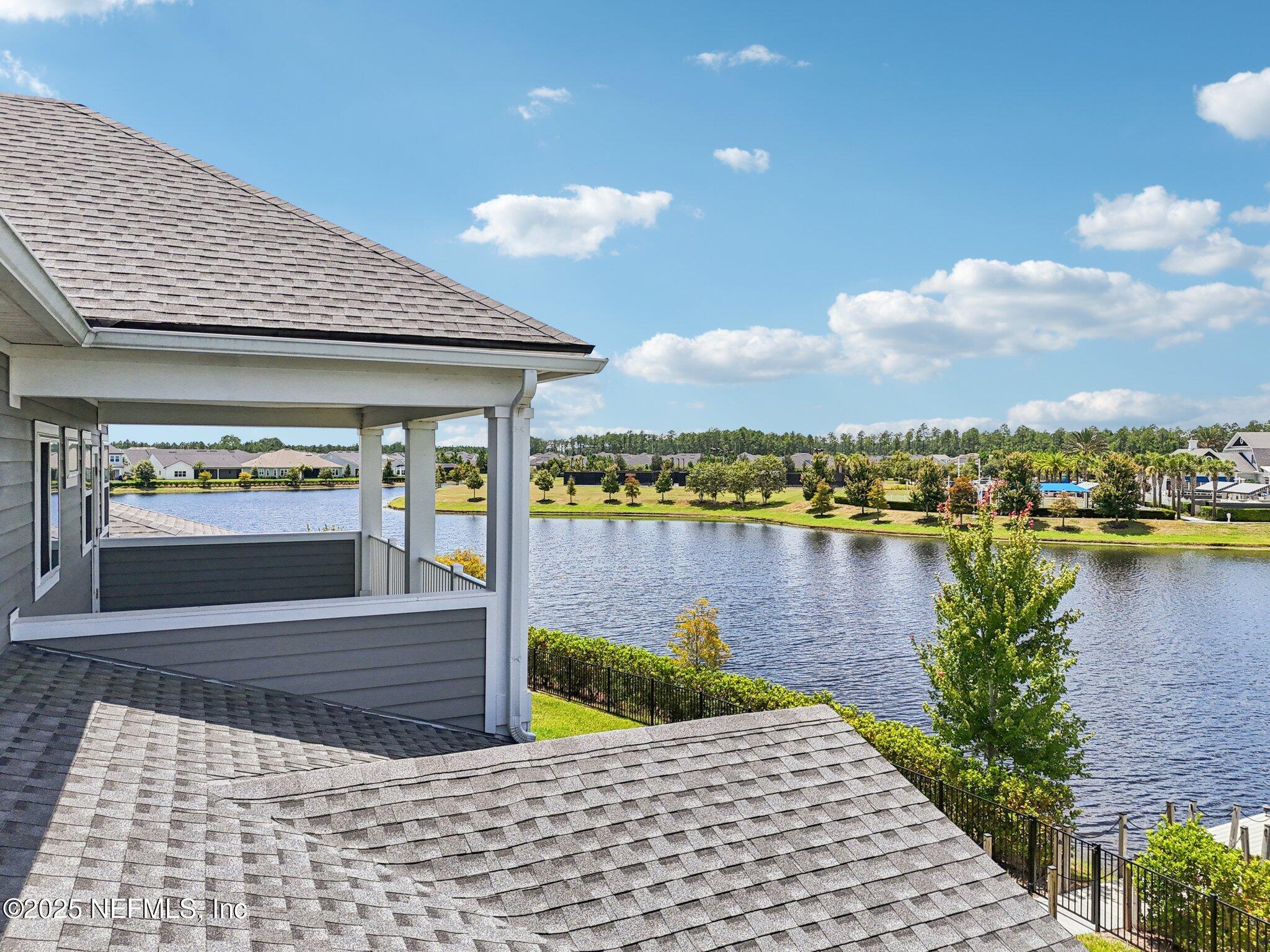 194 Snowbell Court St. Augustine, FL 32095 - Photo 63 of 89 a view of a lake with houses