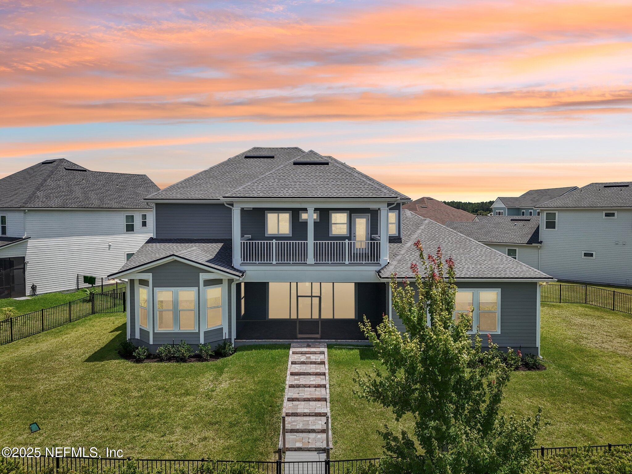 194 Snowbell Court St. Augustine, FL 32095 - Photo 8 of 89 a front view of a house with a yard