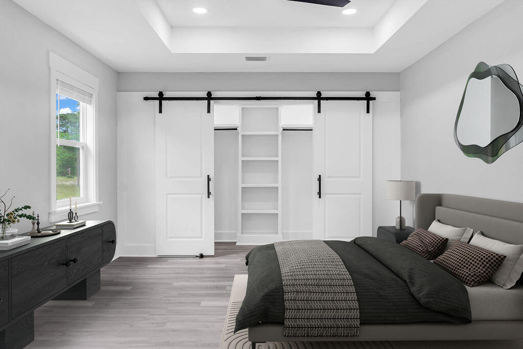 5742 Mt Olive Road Crestview, FL 32539 - Photo 16 of 59 a bedroom with a bed and a window