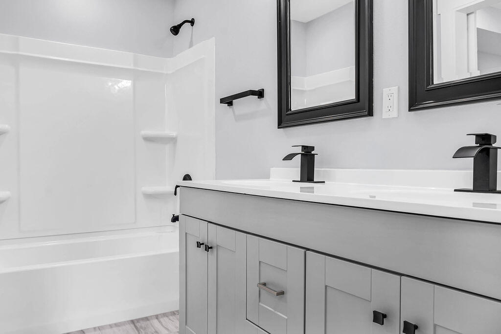 5742 Mt Olive Road Crestview, FL 32539 - Photo 20 of 59 a bathroom with a sink and a bathtub