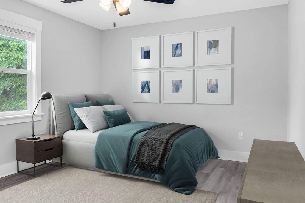 5742 Mt Olive Road Crestview, FL 32539 - Photo 22 of 59 a bedroom with a bed and a window