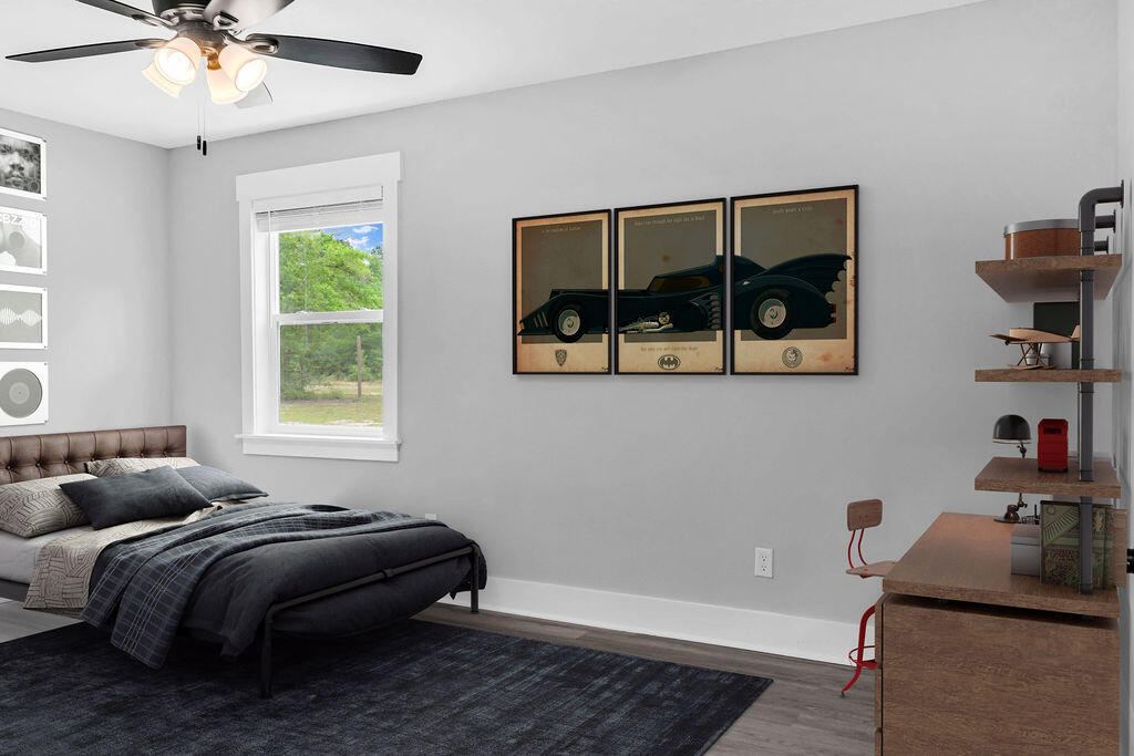 5742 Mt Olive Road Crestview, FL 32539 - Photo 28 of 59 a bedroom with bed and a window