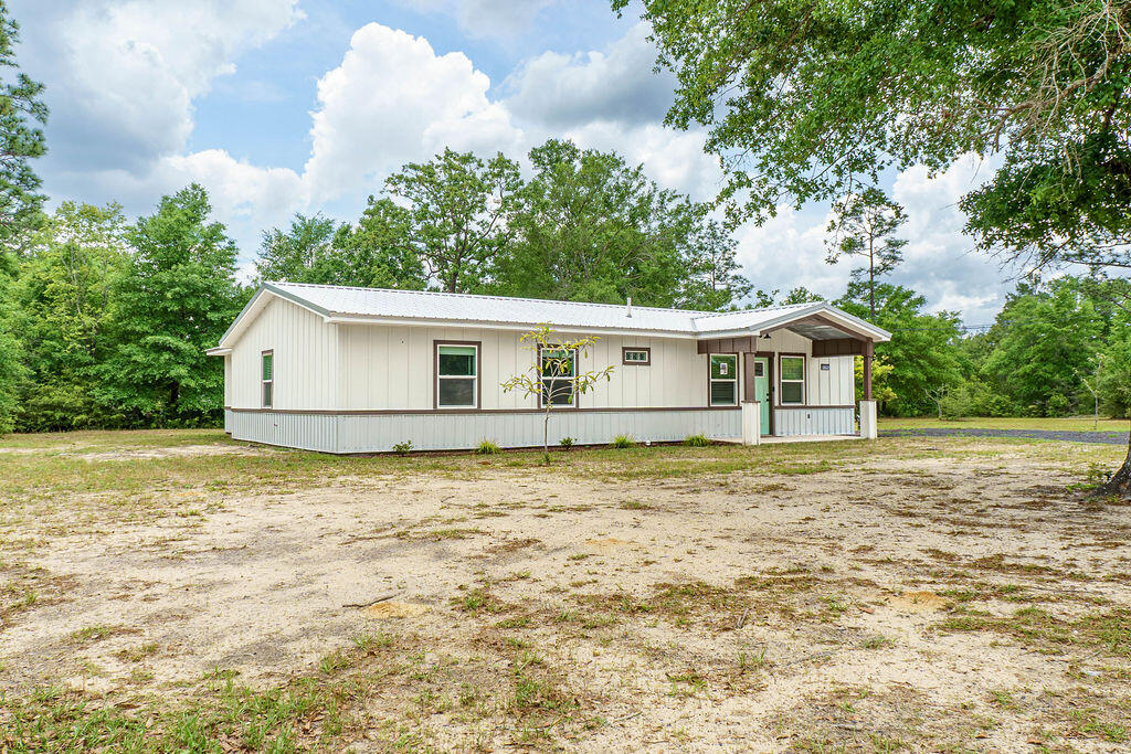 5742 Mt Olive Road Crestview, FL 32539 - Photo 39 of 59 a view of a house with a yard