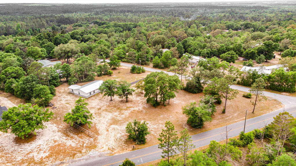 5742 Mt Olive Road Crestview, FL 32539 - Photo 51 of 59 an aerial view of residential house with green space