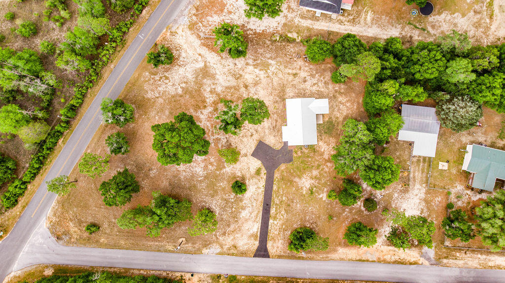 5742 Mt Olive Road Crestview, FL 32539 - Photo 58 of 59 an aerial view of a residential houses with yard