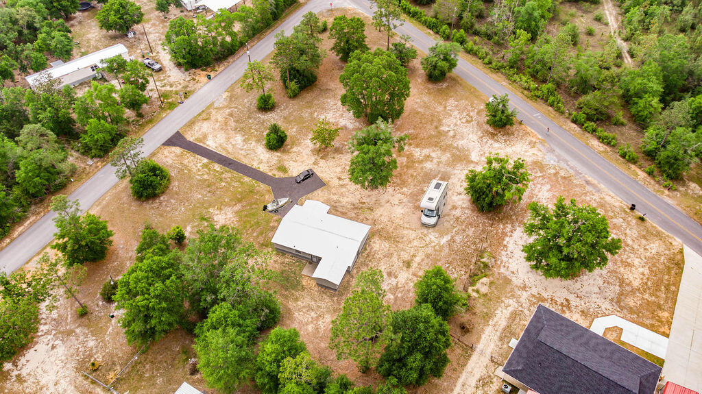5742 Mt Olive Road Crestview, FL 32539 - Photo 59 of 59 an aerial view of a house with a yard