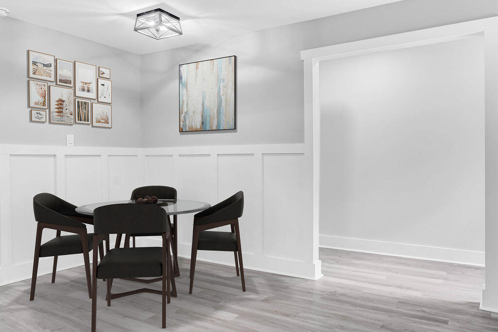 5742 Mt Olive Road Crestview, FL 32539 - Photo 8 of 59 a view of a dining room with furniture and wooden floor