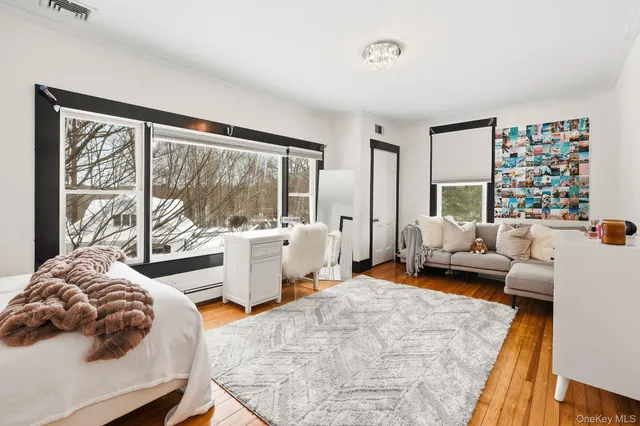 a bedroom with a bed and a walk in closet