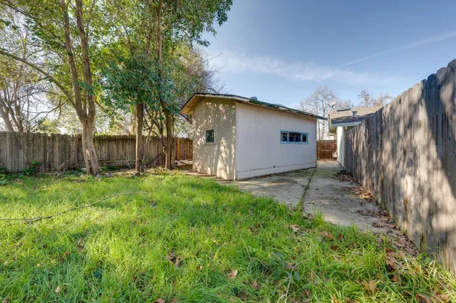 a bathroom with a toilet a sink and a mirror