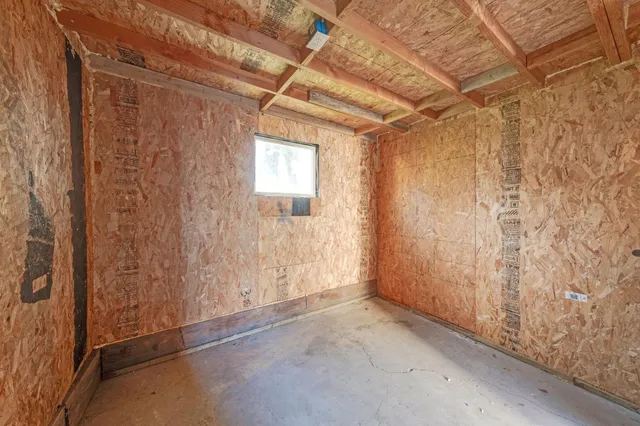 a view of a backyard with plants