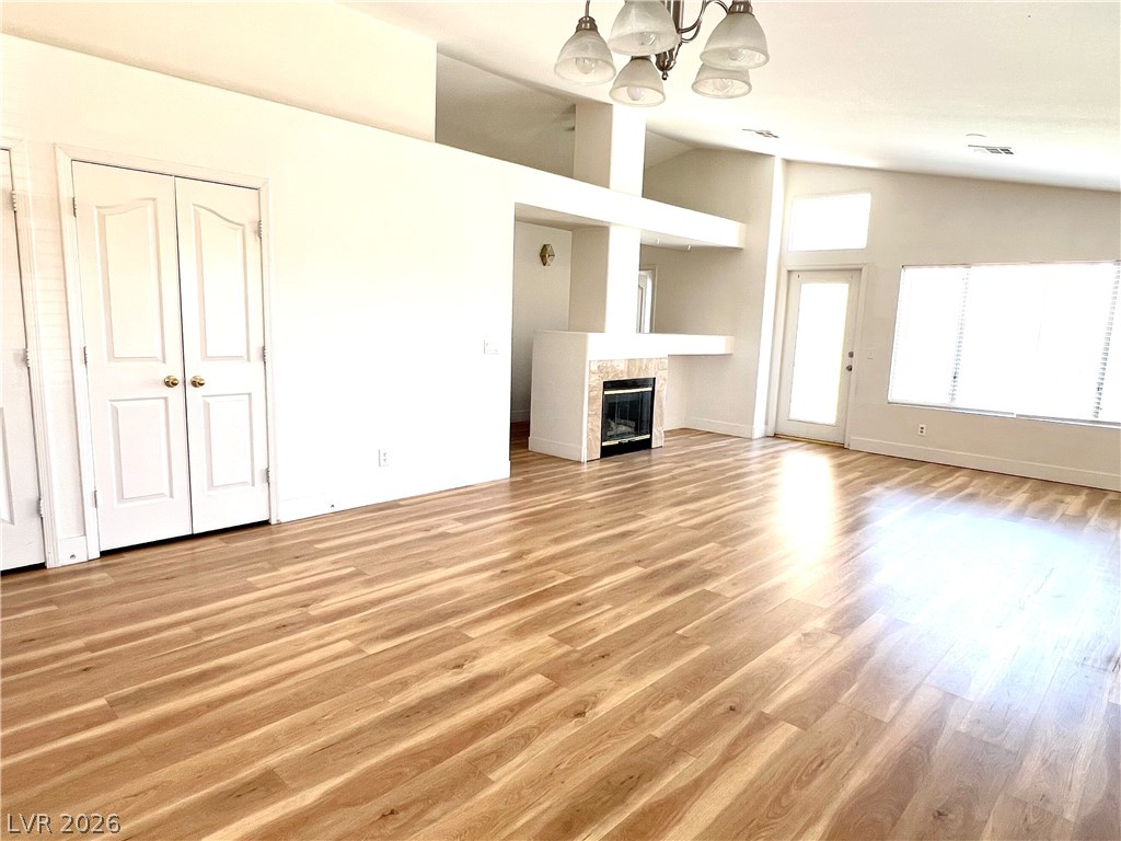 9708 Ridge Creek Place Las Vegas, NV 89134 - Photo 6 of 34 A well-proportioned living area showcases a fireplace with an elegant stone surround.
