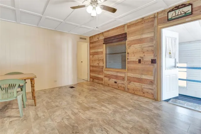 a view of an empty room with a stove