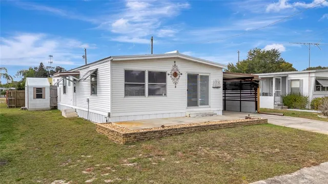 a house with trees in the background