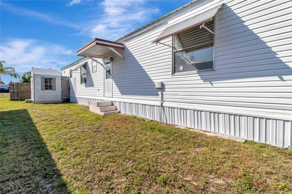 1409 Ridge Road Tavares, FL 32778 - Photo 32 of 36 a view of a house with a large window