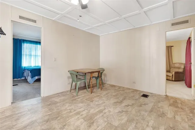 a view of a room with furniture and closet