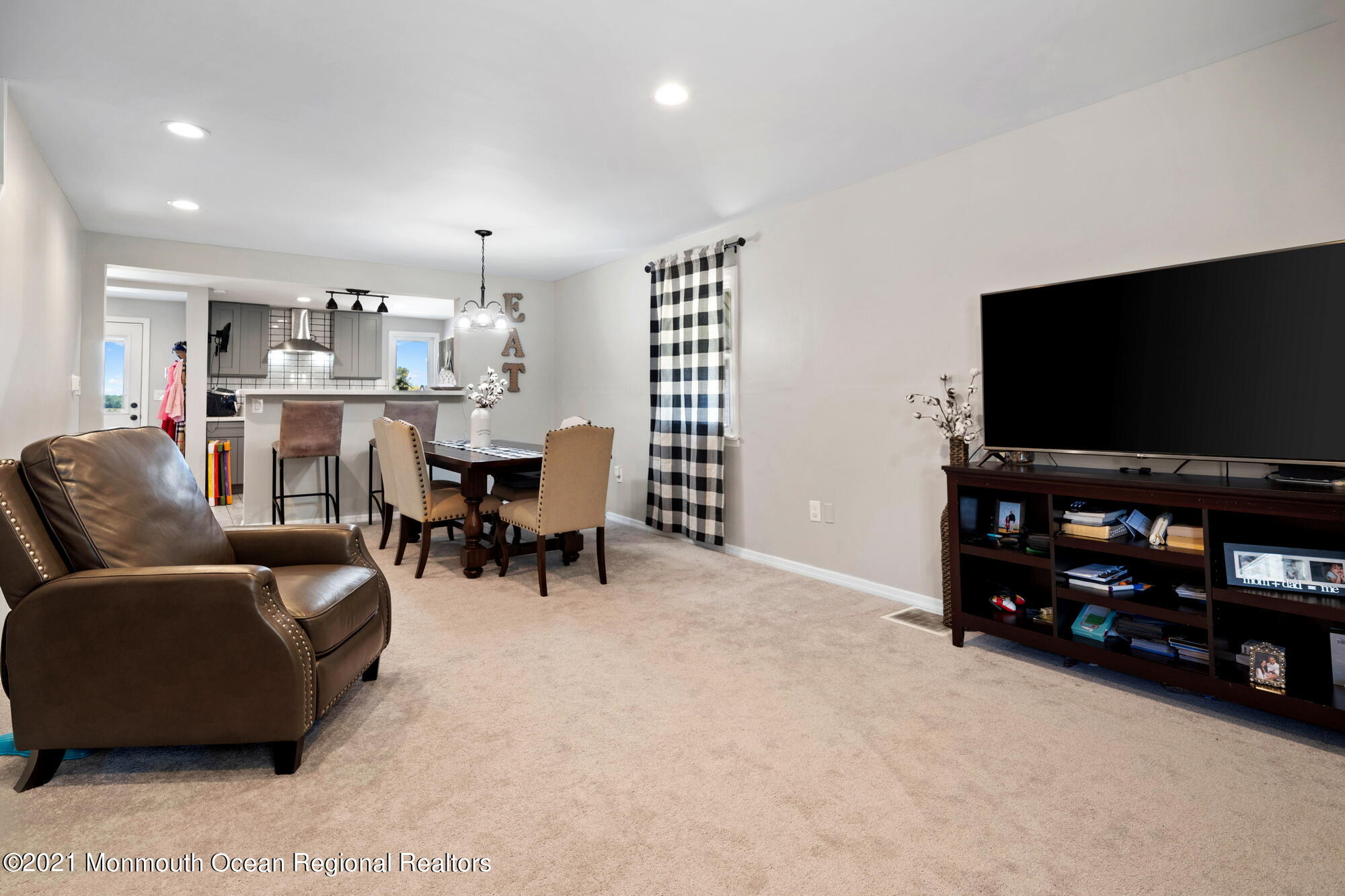 2477 Monmouth Road Jobstown, NJ 08041 - Photo 11 of 37 a living room with furniture and a flat screen tv