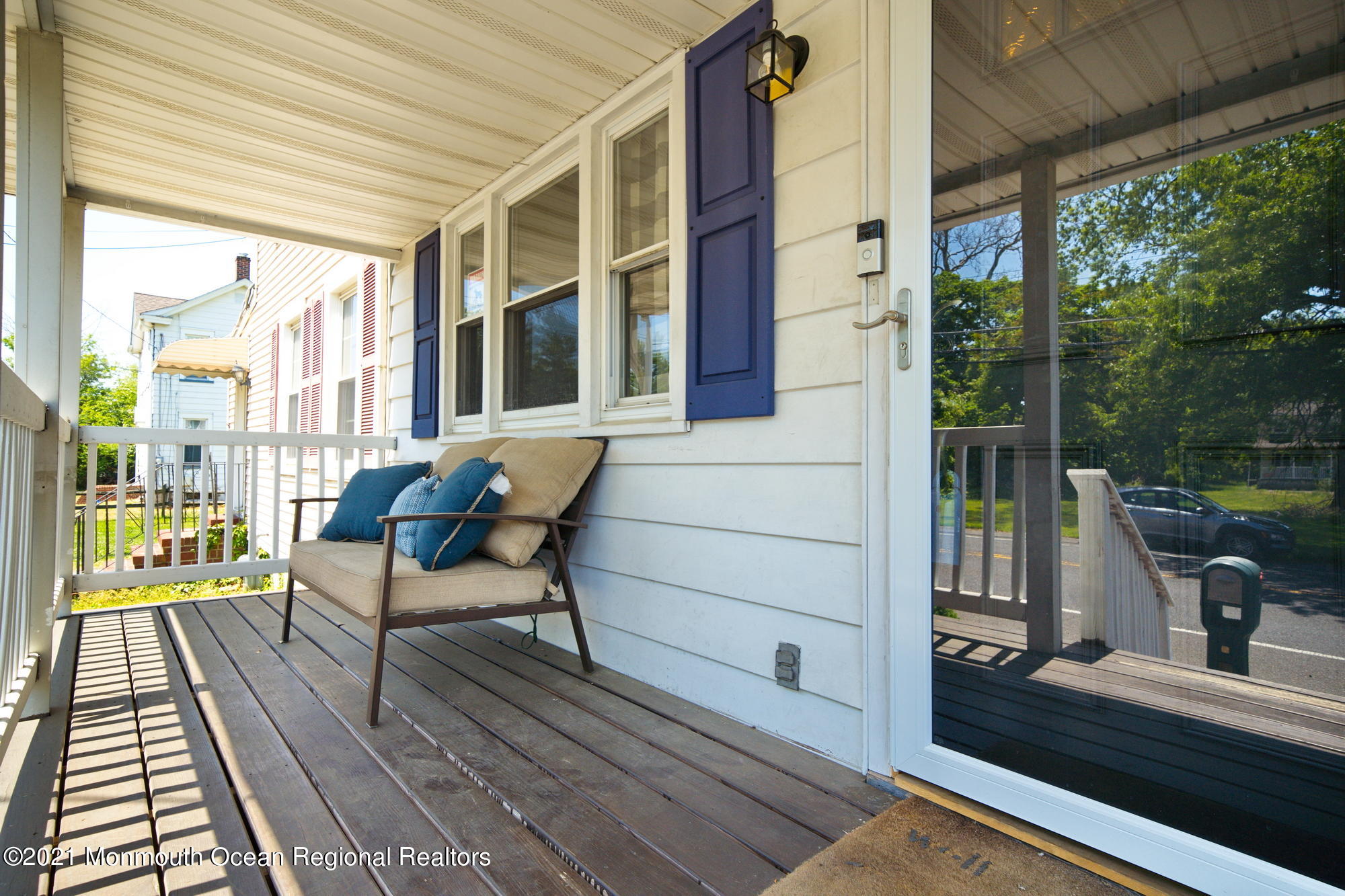 2477 Monmouth Road Jobstown, NJ 08041 - Photo 24 of 37 a balcony with wooden floor and outdoor seating