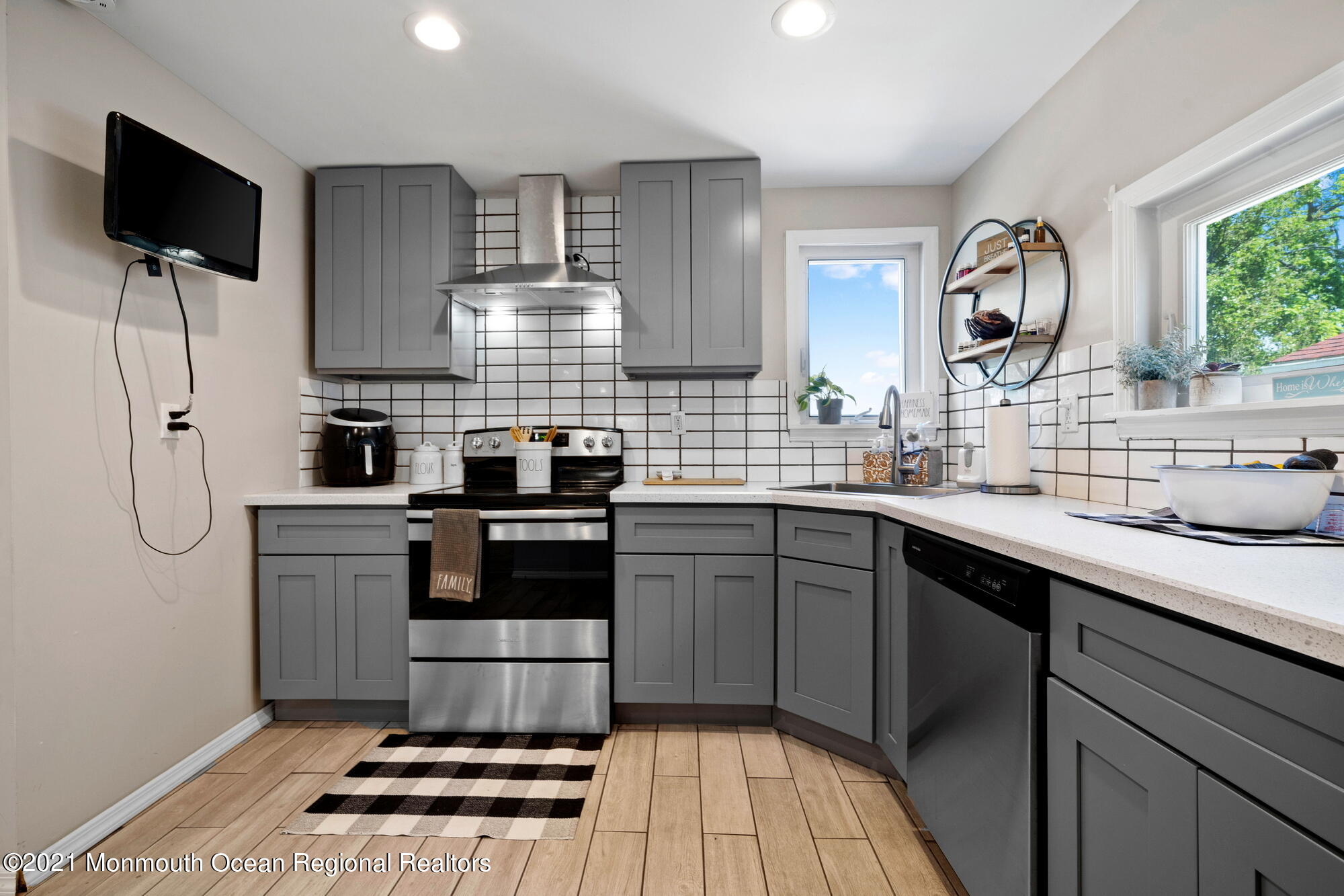 2477 Monmouth Road Jobstown, NJ 08041 - Photo 29 of 37 a kitchen with a refrigerator and a sink