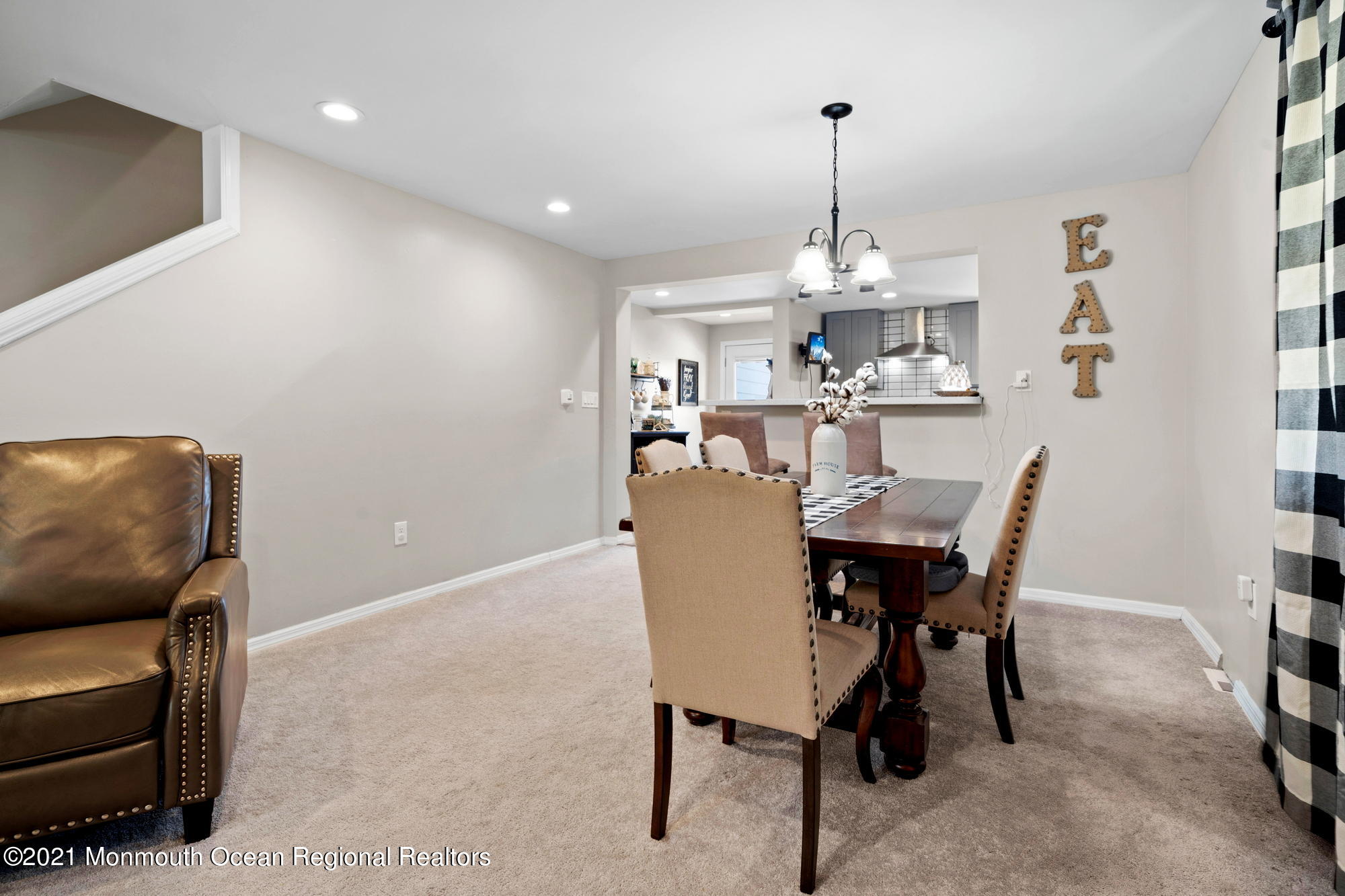 2477 Monmouth Road Jobstown, NJ 08041 - Photo 36 of 37 a dining room with furniture a chandelier and window