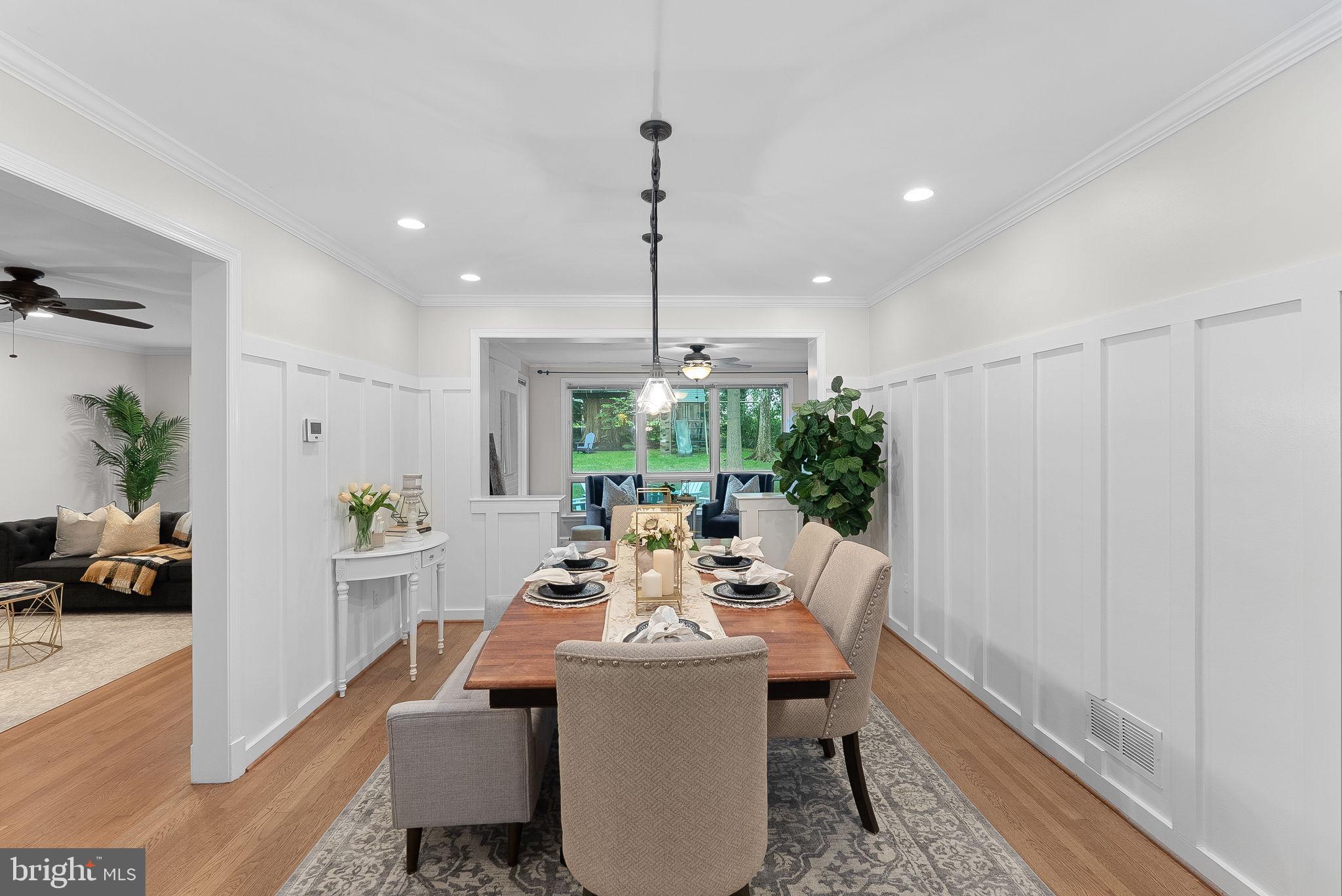 8707 Ridge Road Bethesda, MD 20817 - Photo 12 of 70 a view of a dining room with furniture window and outside view