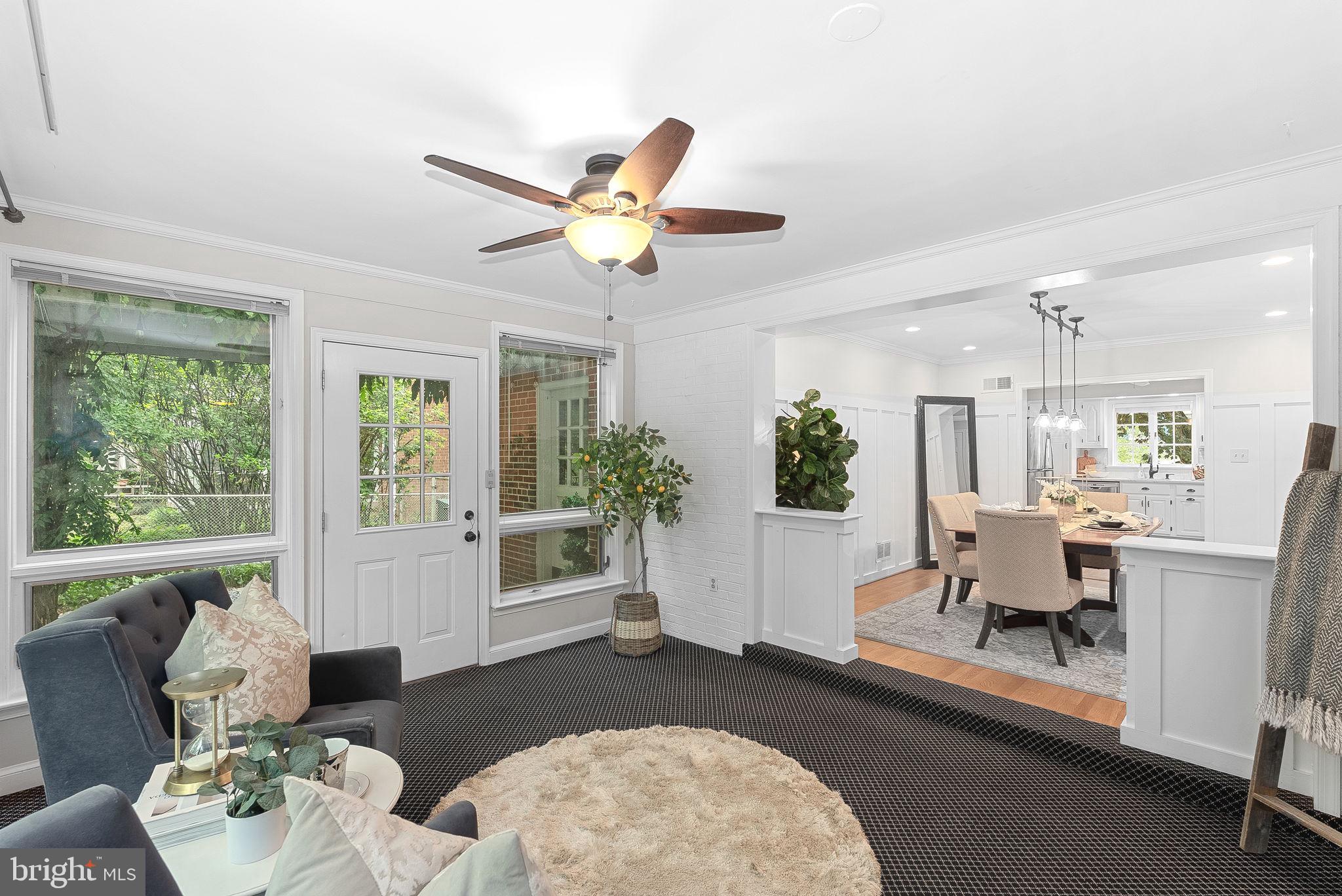 8707 Ridge Road Bethesda, MD 20817 - Photo 21 of 70 a living room with furniture and a large window