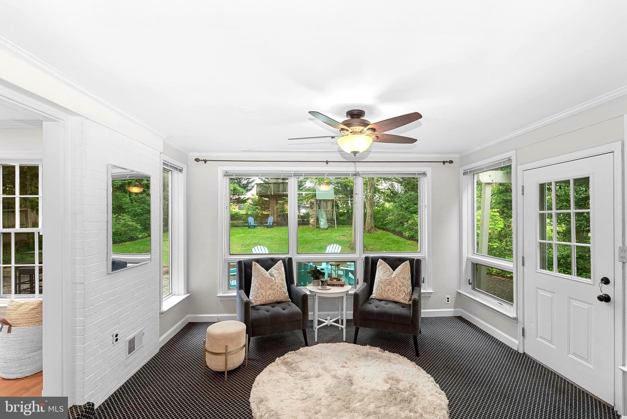 8707 Ridge Road Bethesda, MD 20817 - Photo 22 of 70 a living room with furniture and a large window
