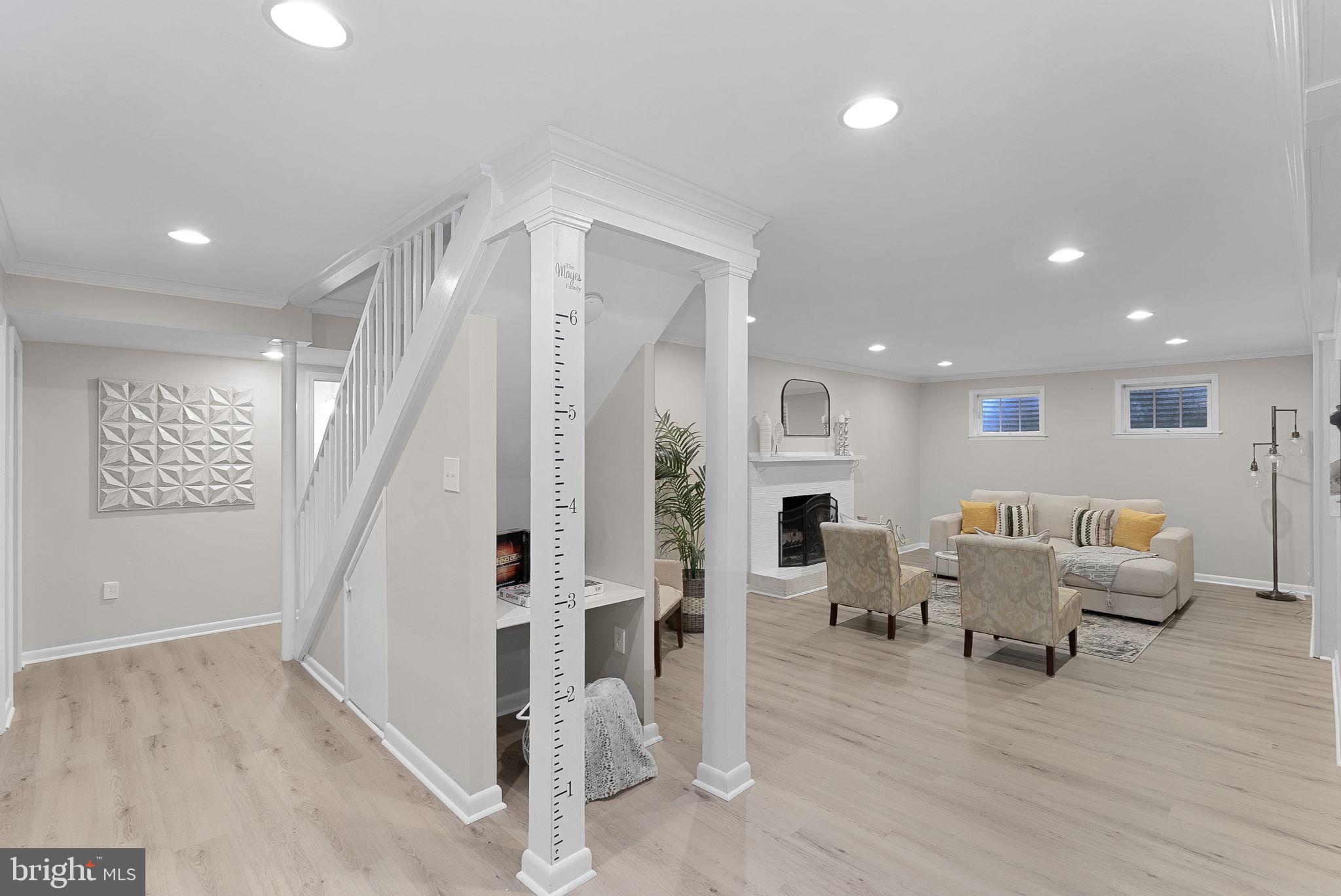 8707 Ridge Road Bethesda, MD 20817 - Photo 27 of 70 a living room with furniture and a wooden floor