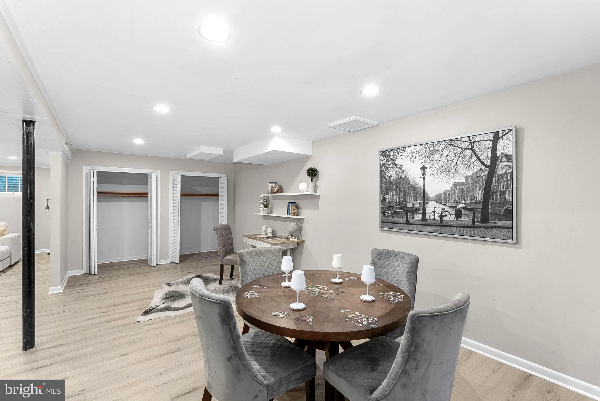 8707 Ridge Road Bethesda, MD 20817 - Photo 62 of 70 a dining room with furniture and wooden floor