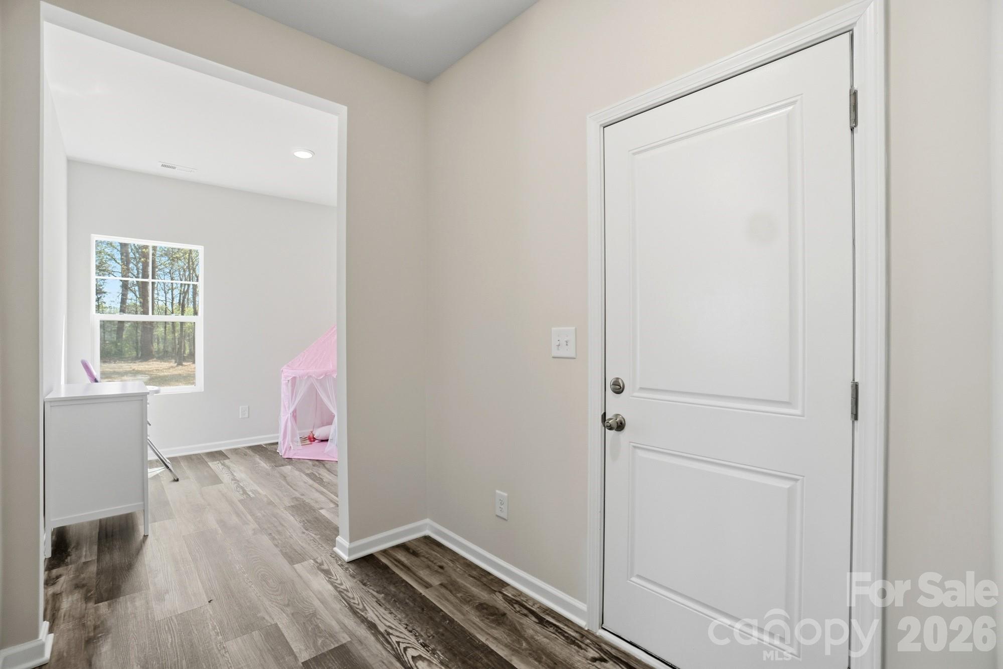 3248 Killian Road Lincolnton, NC 28092 - Photo 19 of 44 a room with a window and wooden floor