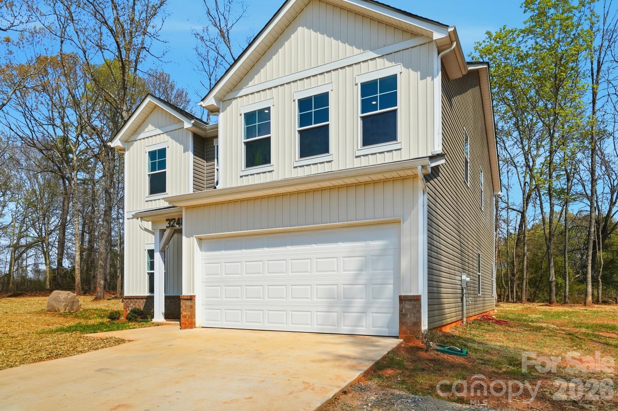 3248 Killian Road Lincolnton, NC 28092 - Photo 2 of 44 a front view of a house with a outdoor space