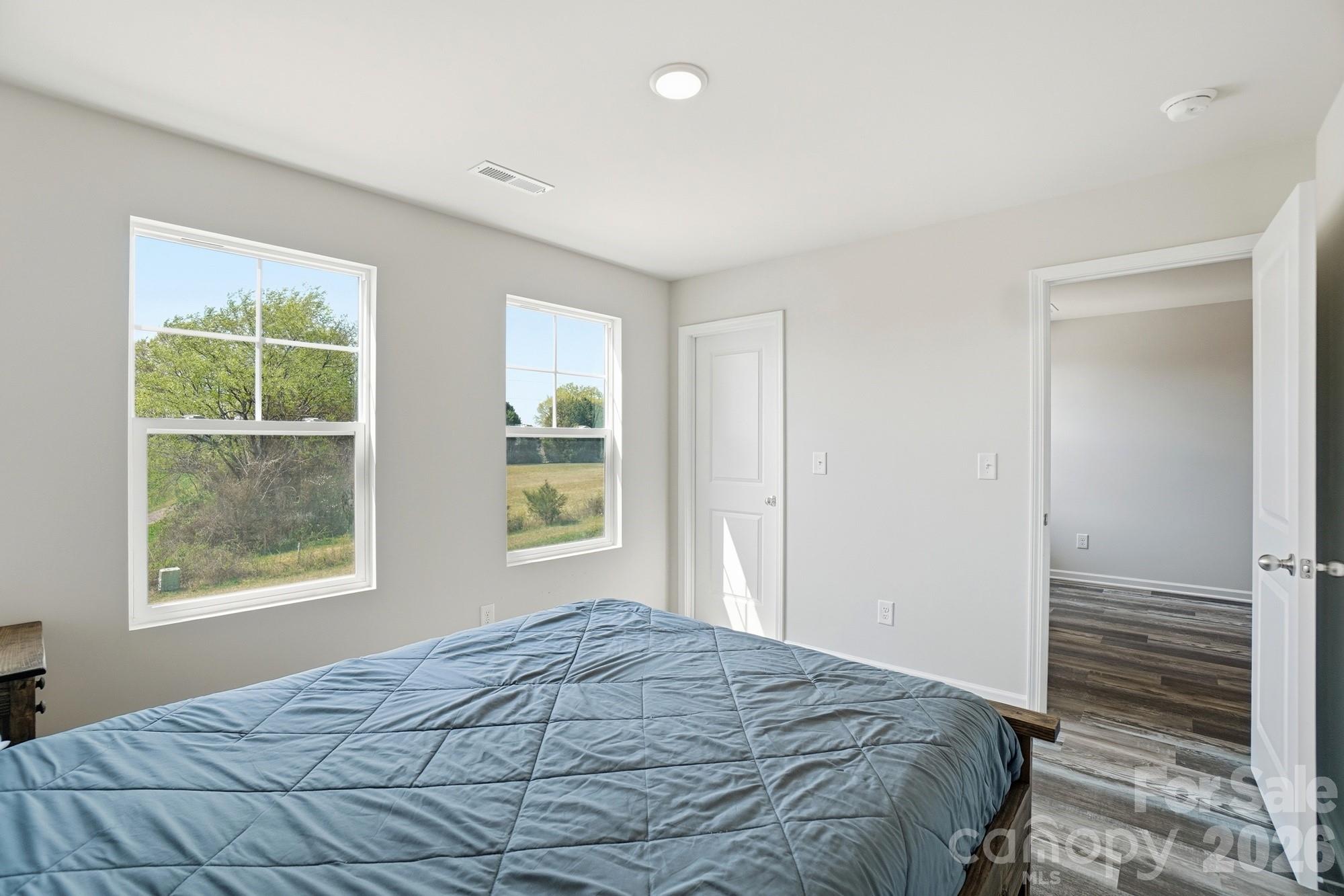 3248 Killian Road Lincolnton, NC 28092 - Photo 33 of 44 a bedroom with a bed and a window