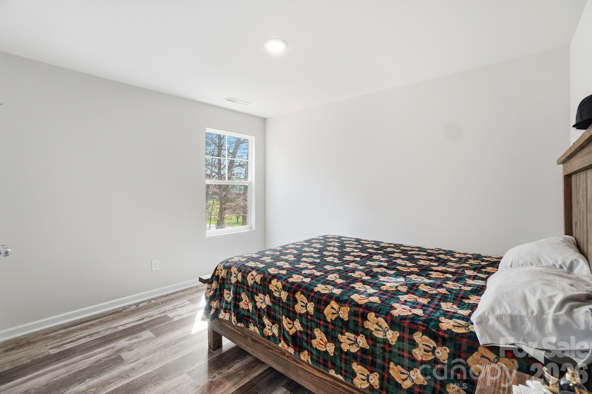 3248 Killian Road Lincolnton, NC 28092 - Photo 37 of 44 a bedroom with a bed and a window