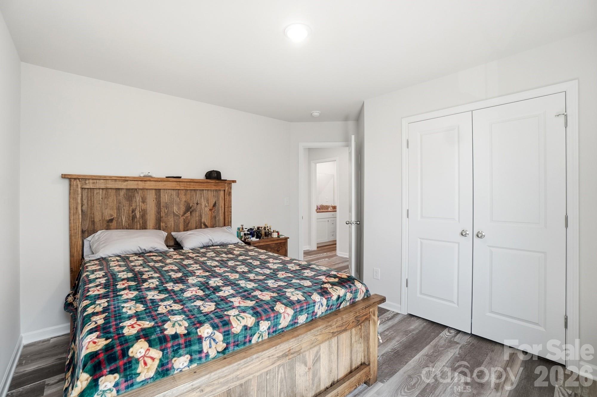 3248 Killian Road Lincolnton, NC 28092 - Photo 38 of 44 a bedroom with a bed and a dresser