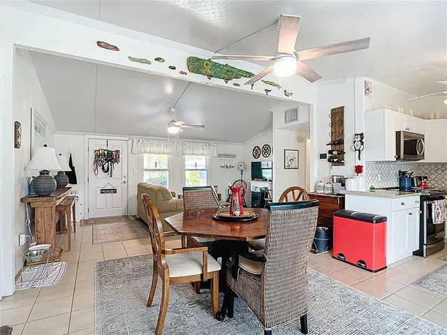 a view of a dining room with furniture