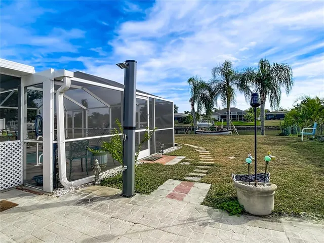 a view of a lake with a sitting space