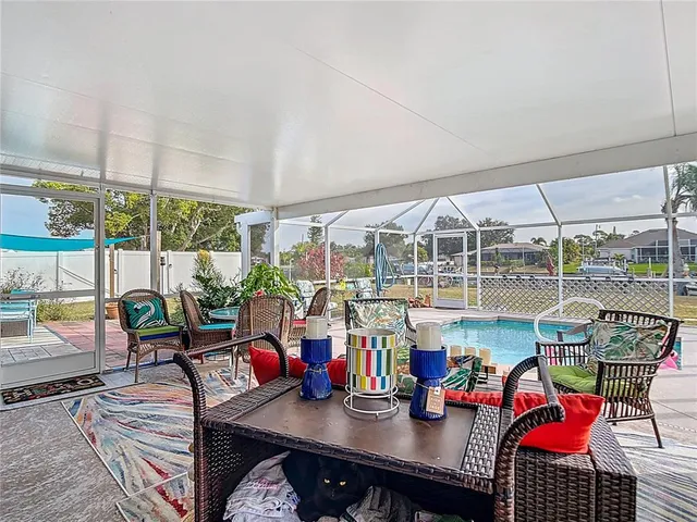 a outdoor living space with furniture and a potted plant